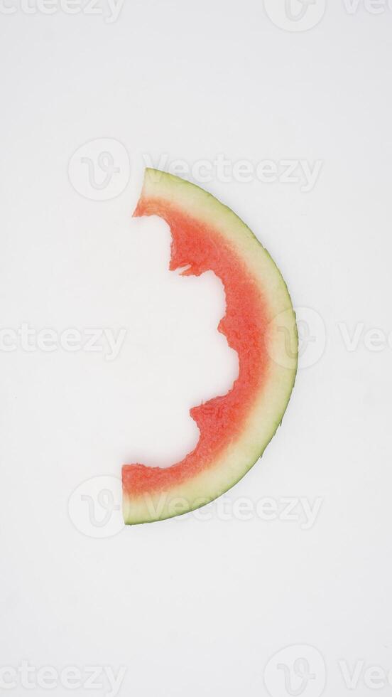 Slice of Watermelon Rind on White Background photo