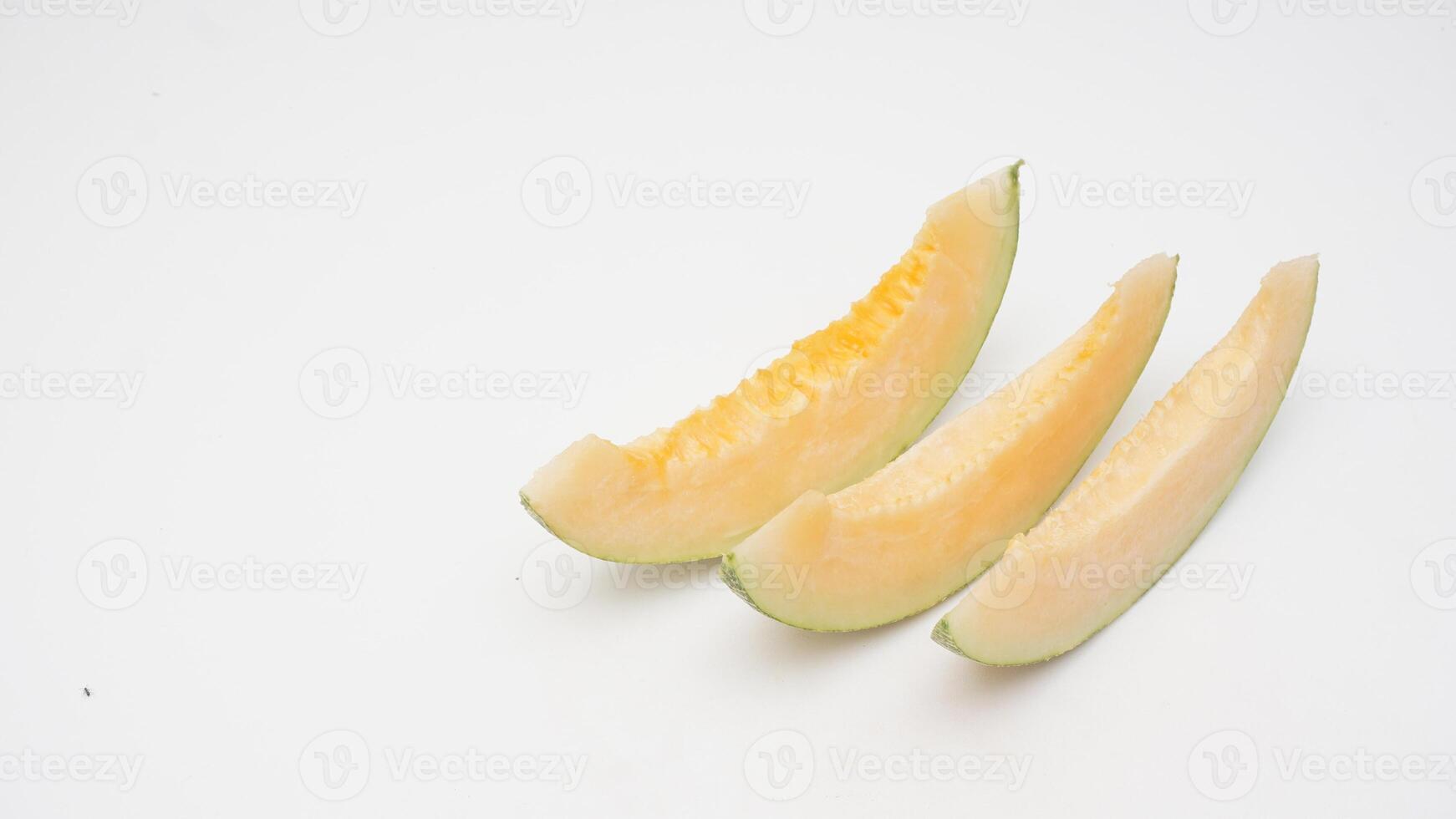 Three Slices of Fresh Cantaloupe Melon on White Background photo