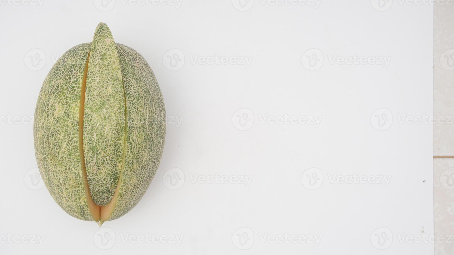 Top View of Cantaloupe Melon with Sliced on White Background photo