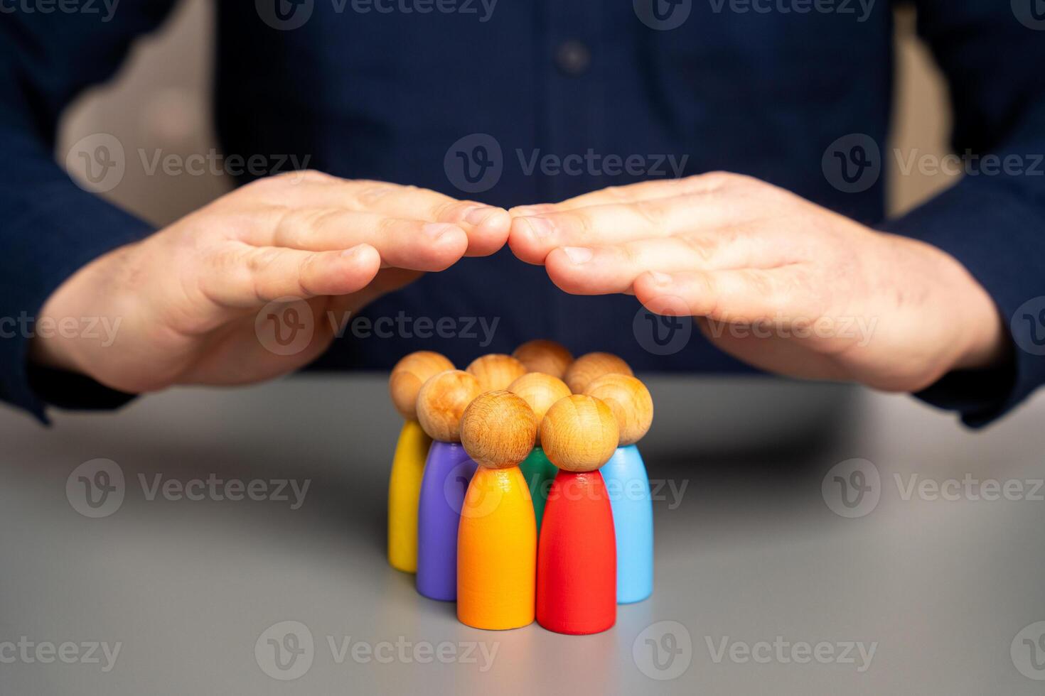 Boss defending his team with a gesture of protection. photo