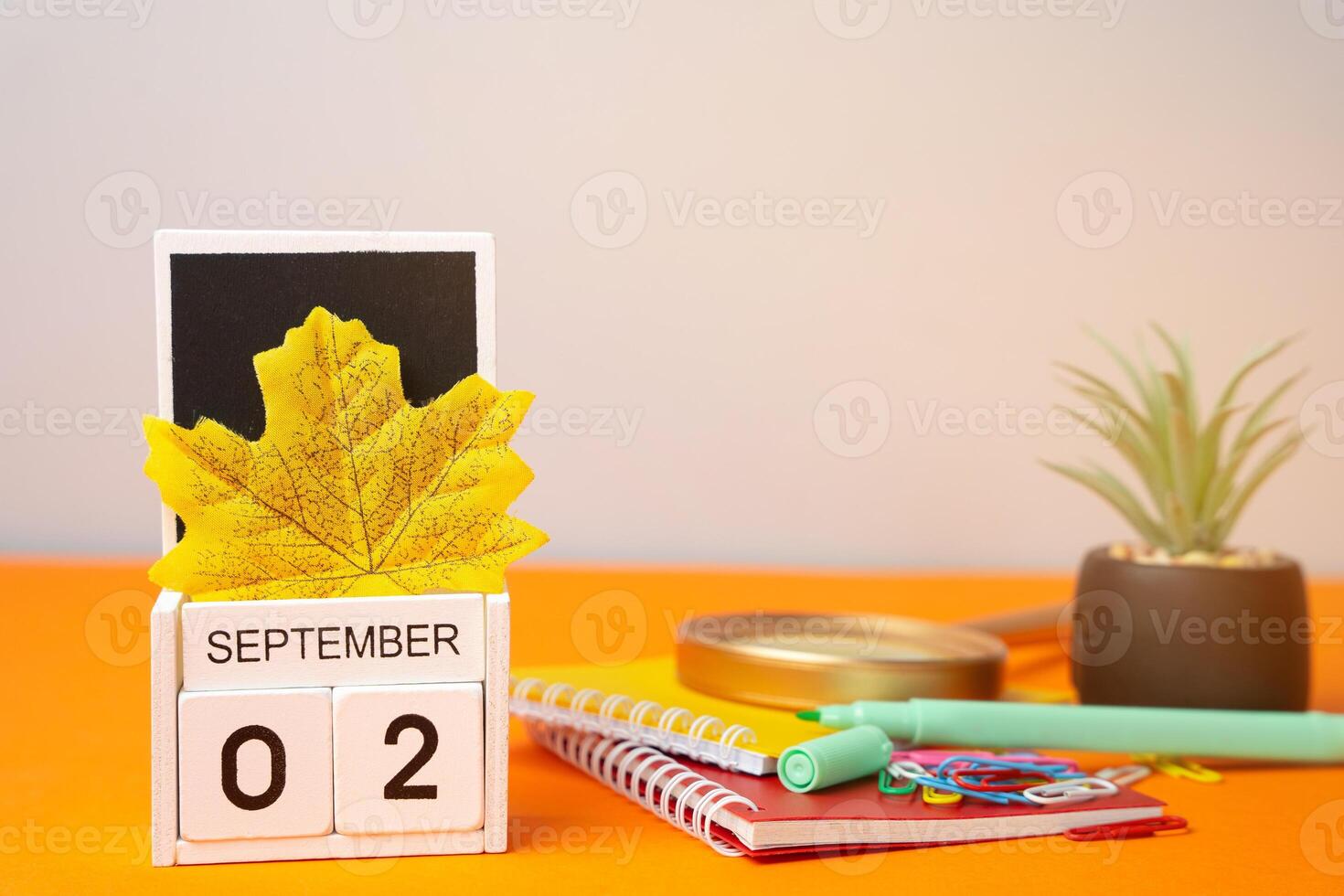 Wooden calendar with words September 2nd. photo