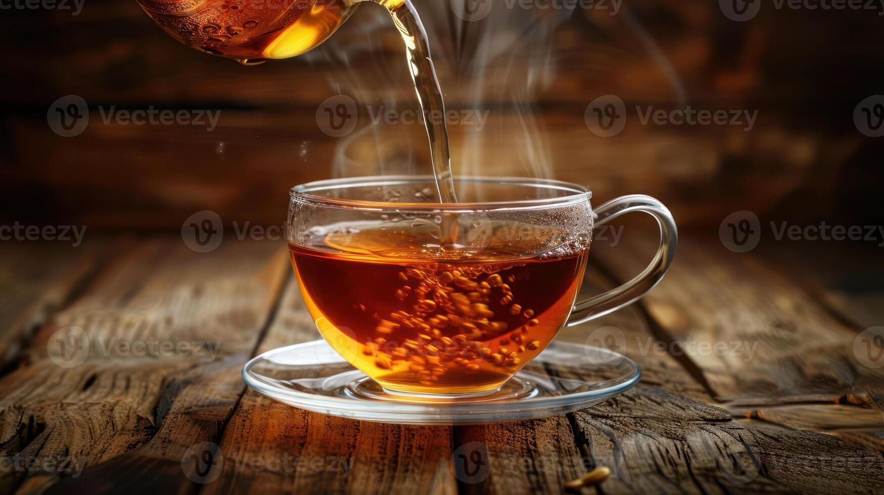 A steaming cup of tea being poured on a rustic wooden table, with warm lighting enhancing the scene photo