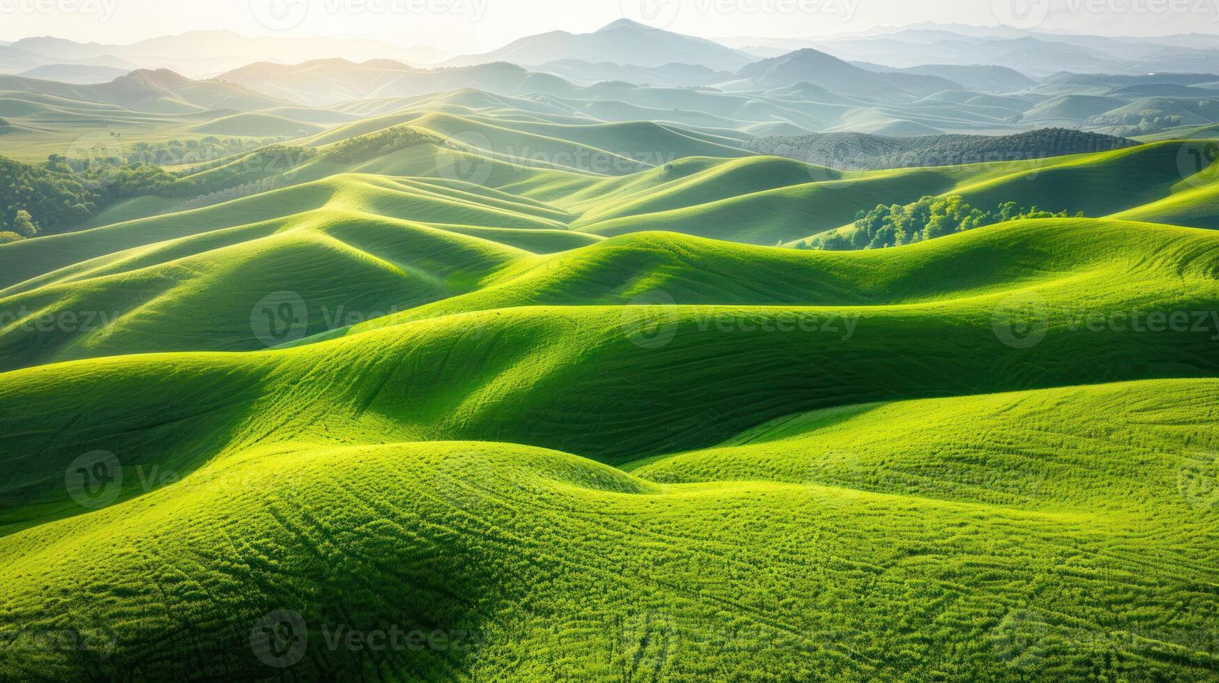 Lush green rolling hills under a bright sky, showcasing nature's beauty and tranquility photo