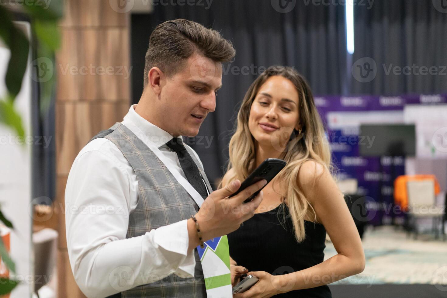 Professional Interaction at a Business Event Capturing Confidence and Engagement. photo