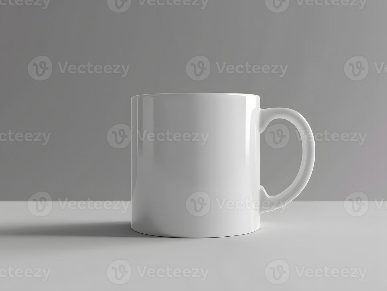 A white mug is sitting on a table photo