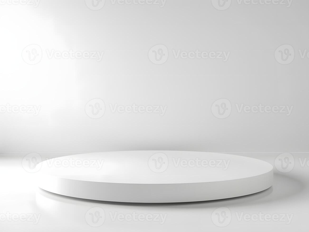 A white round table in front of a white wall photo
