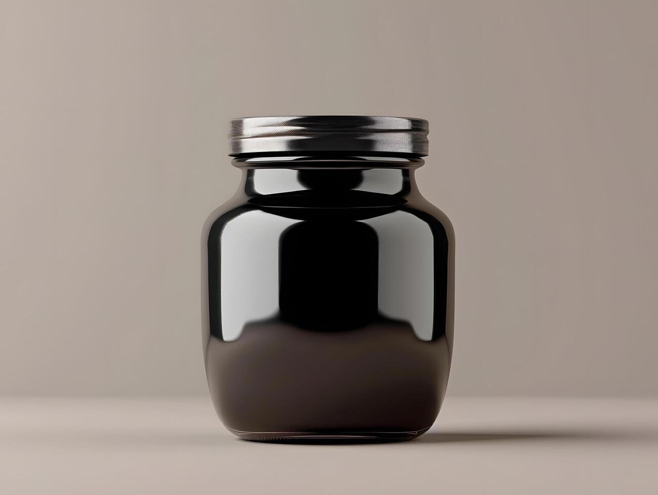 Black glass jar with lid on a table photo