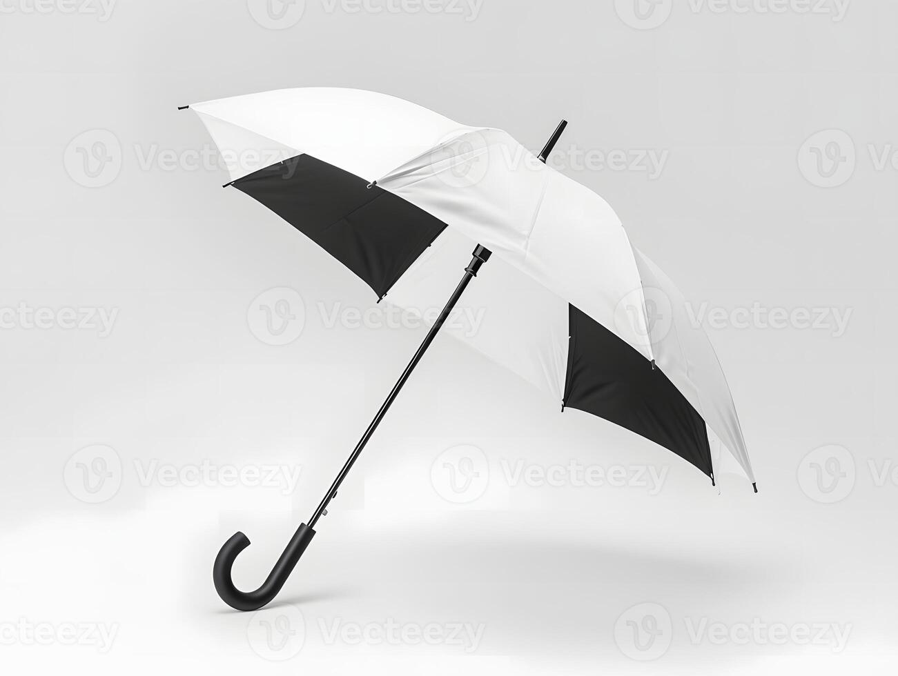A white and black umbrella with a black handle photo