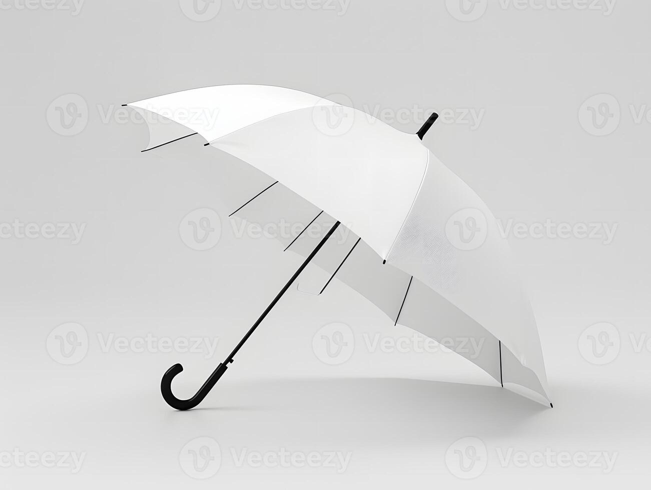 An open white umbrella on a gray background photo