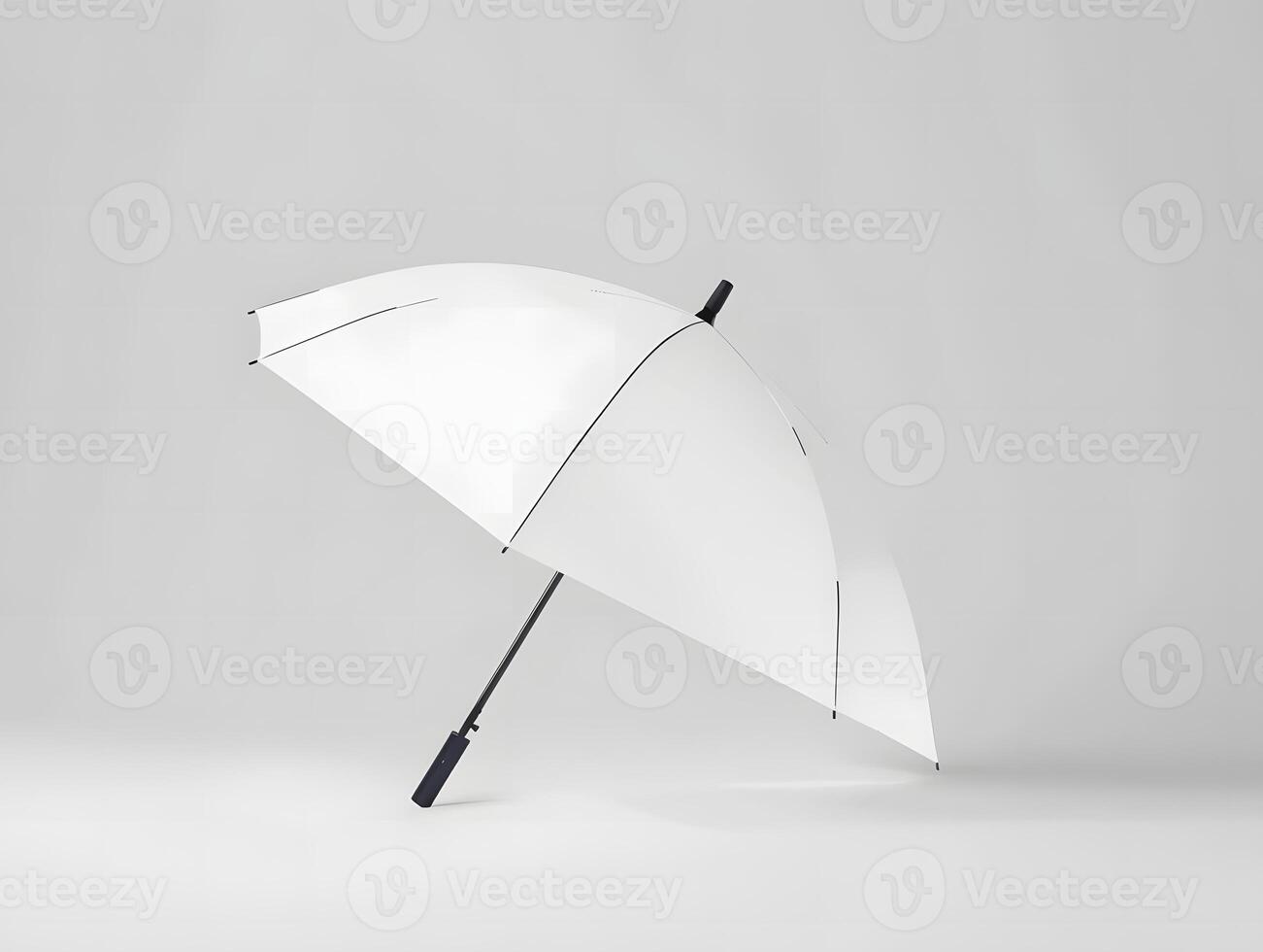A white umbrella with black handle on a white surface photo