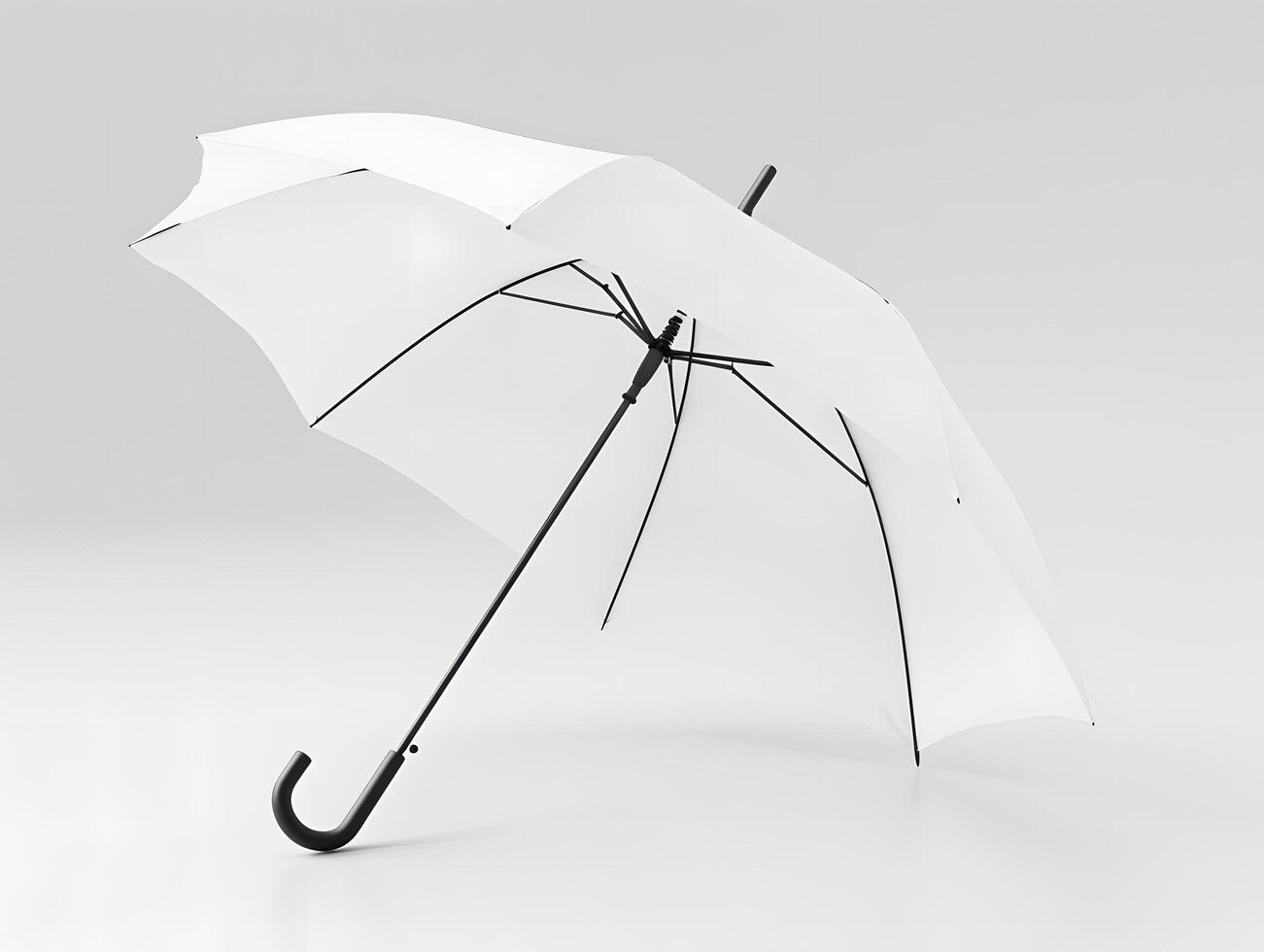 An open white umbrella on a white surface photo