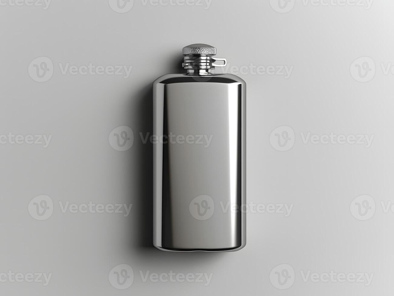 A silver flask on a white surface photo