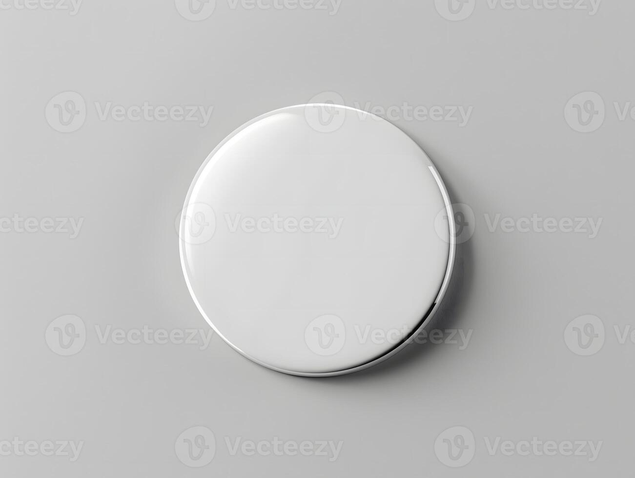 A white round object on a gray surface photo