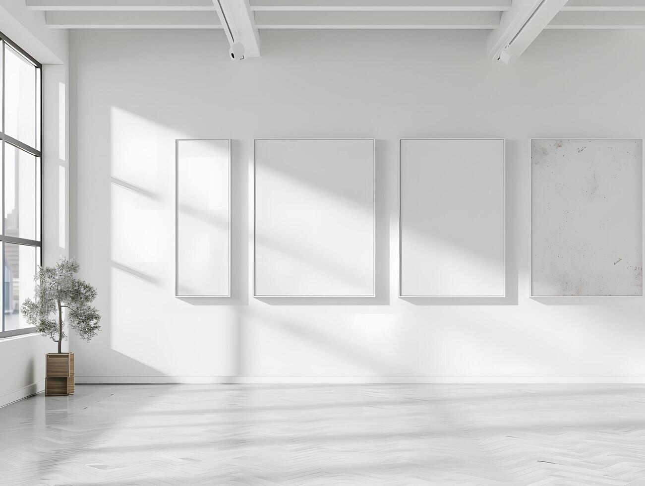 Empty white room with three blank frames on the wall photo
