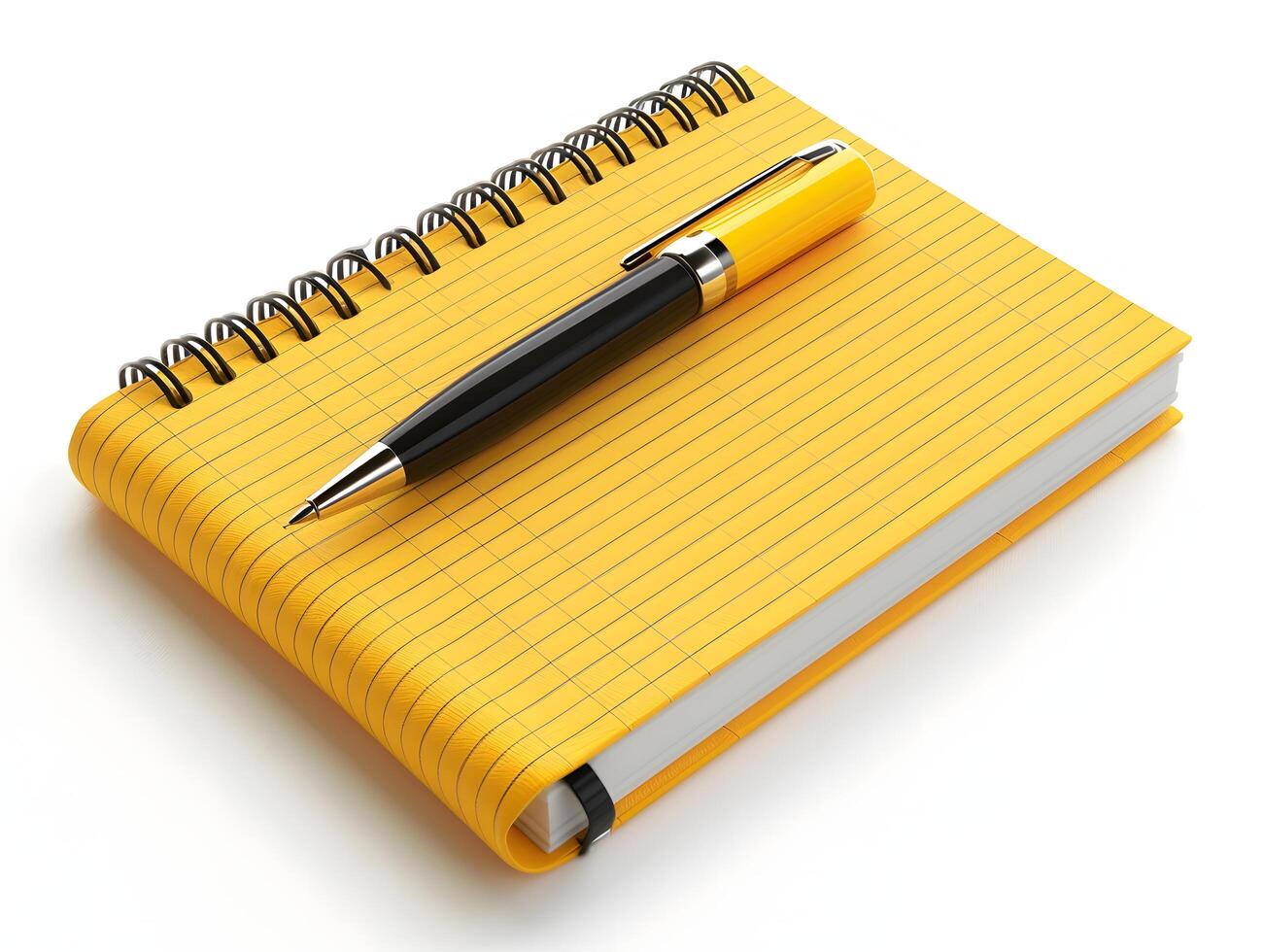 A yellow notebook with a pen on top photo
