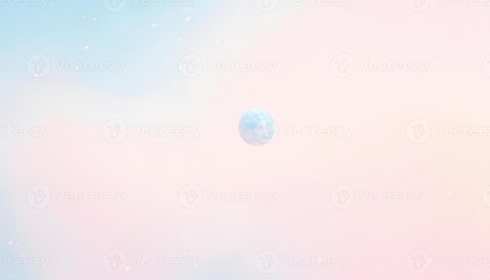 A blue ball floating in the sky with a pink and blue background photo