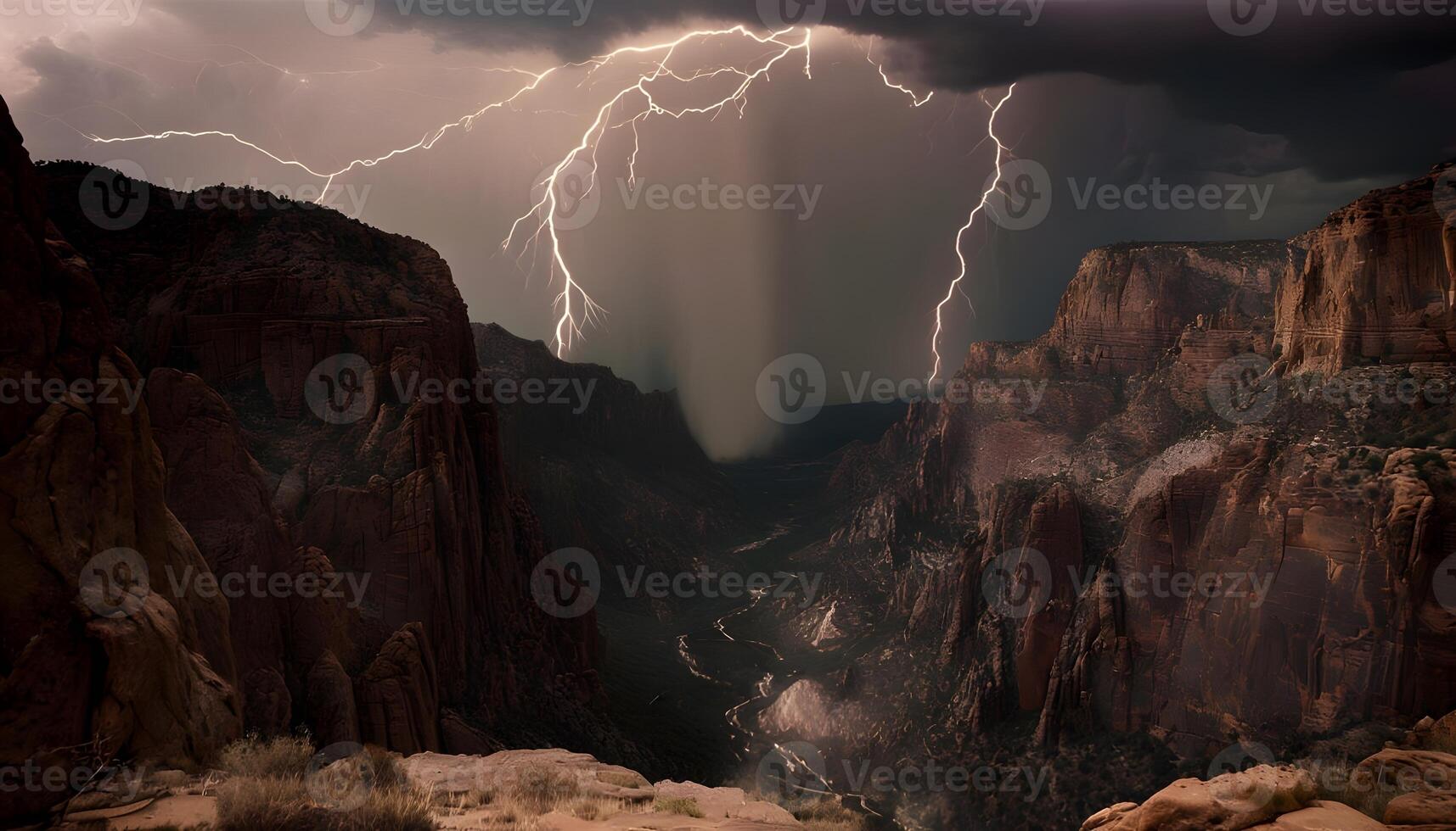 Lightning strikes over a canyon in the desert photo