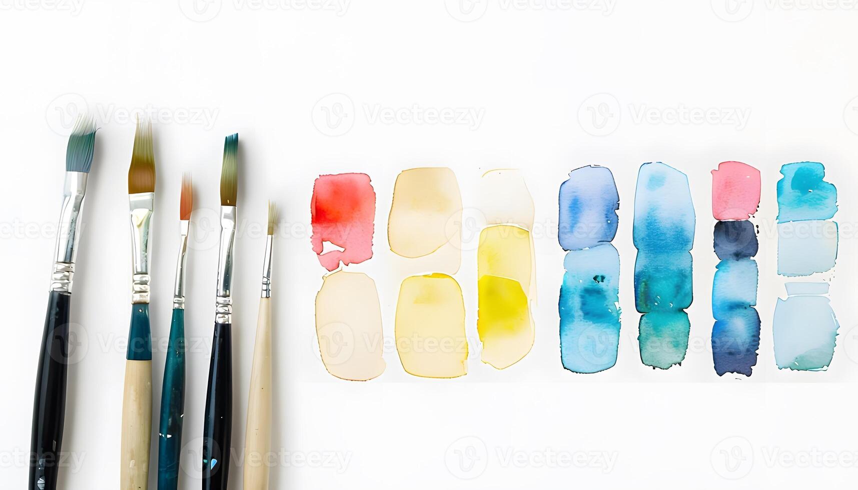 A white surface with a bunch of paint brushes photo