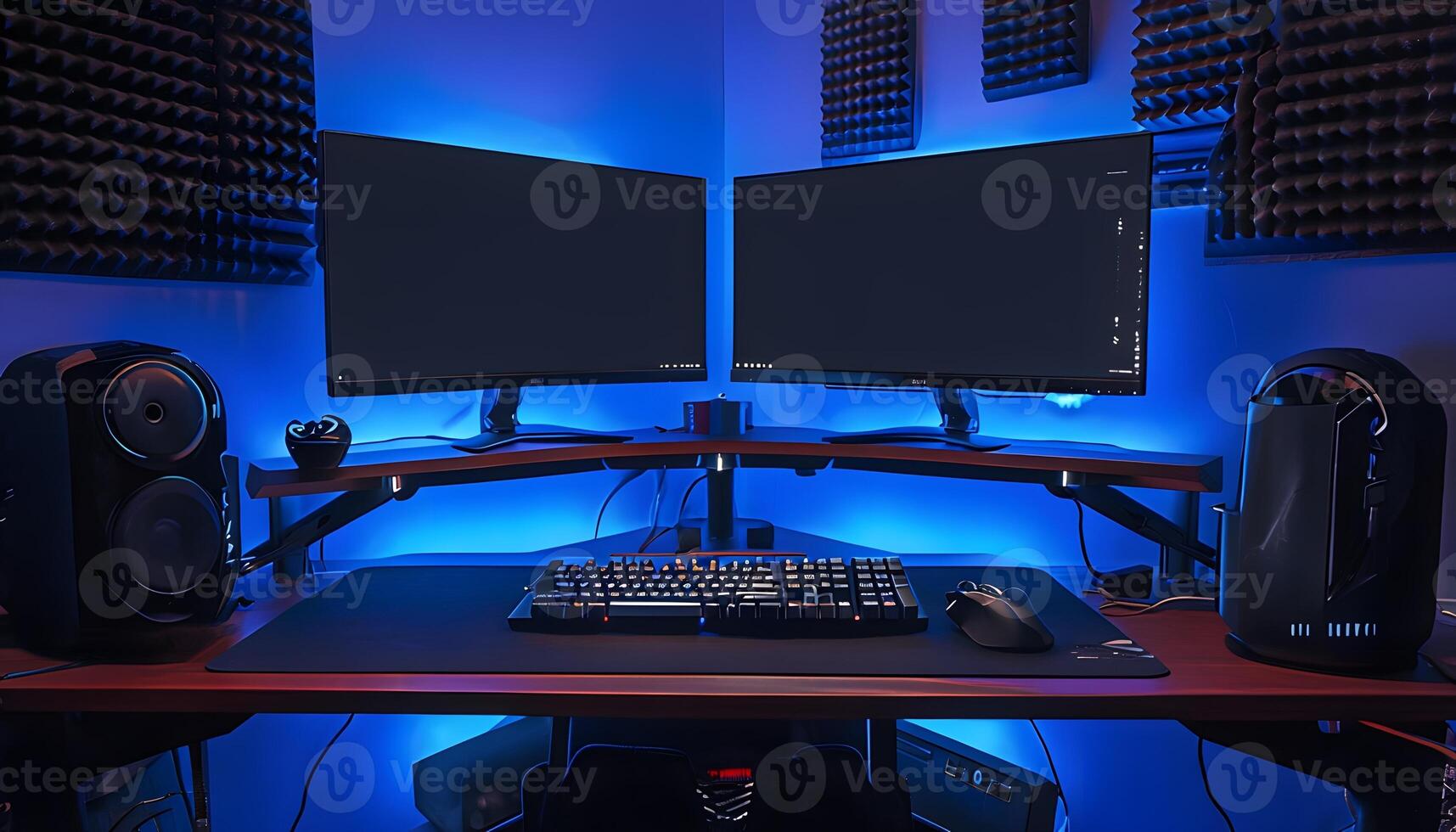 A computer desk with two monitors and a keyboard photo