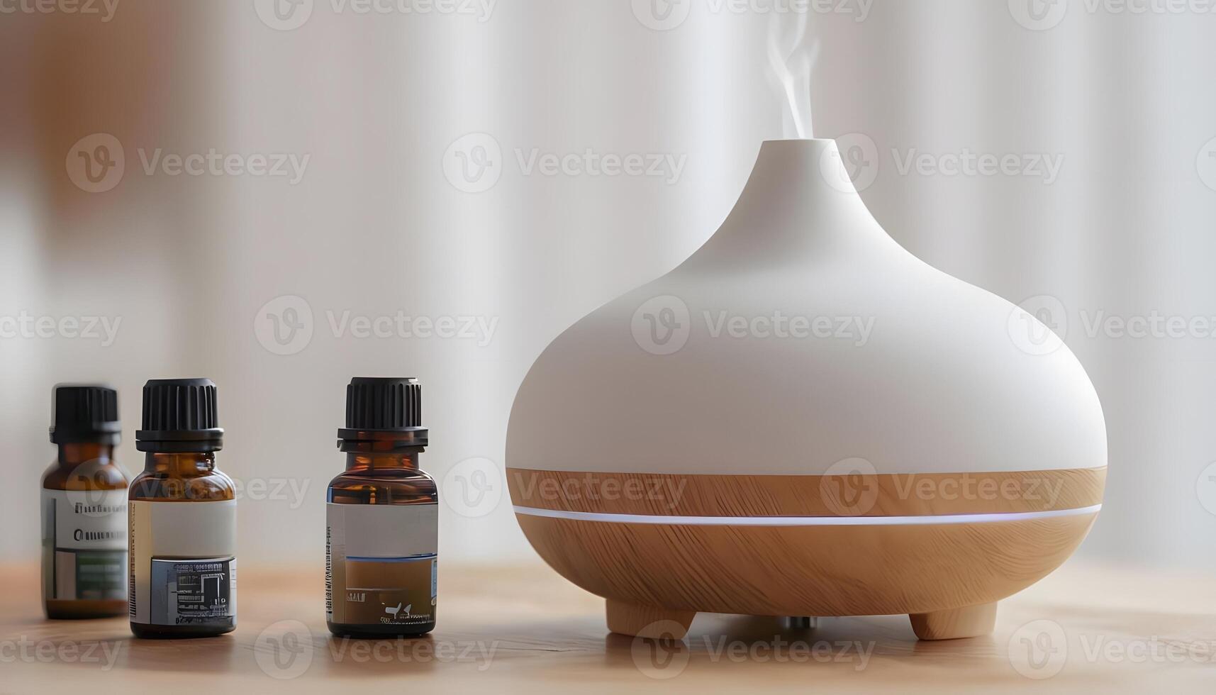 A white and wooden aroma diffuser with three different essential oils photo