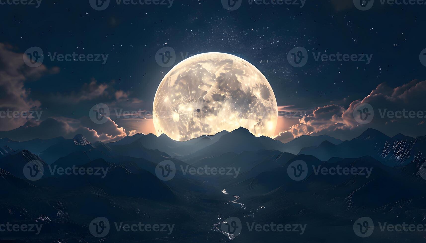 A full moon is seen over a mountain range photo