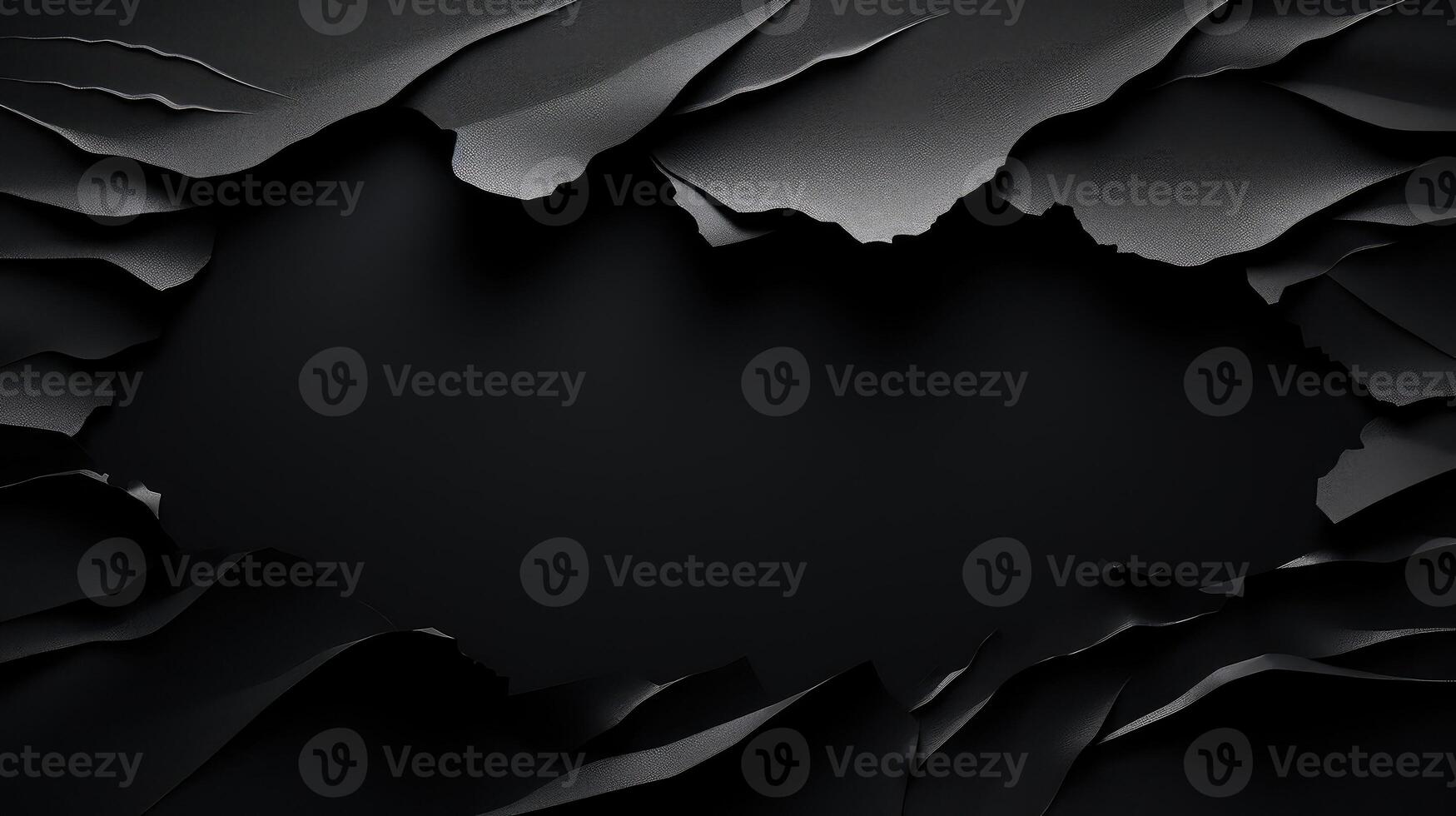 edge torn black paper photo