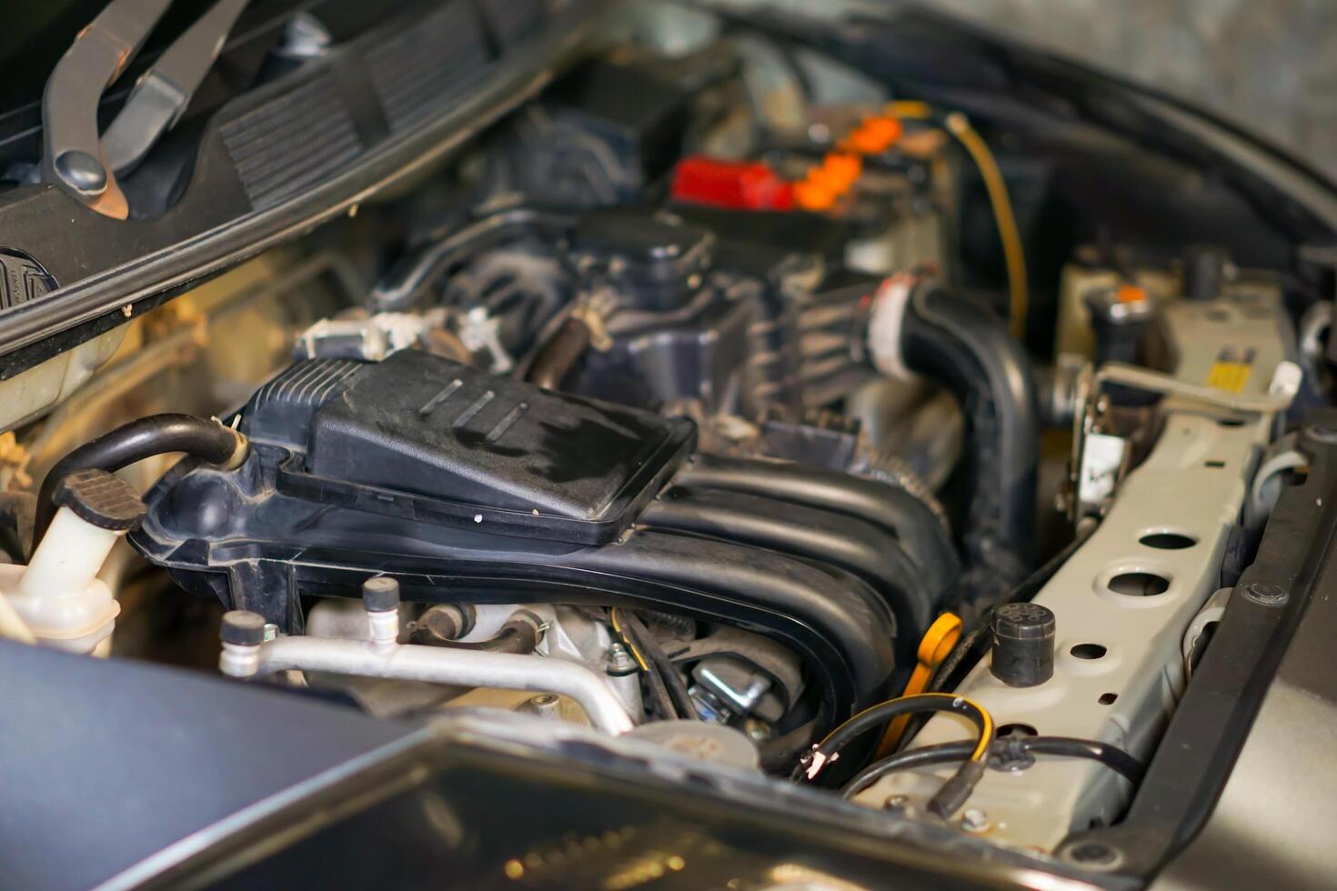 a close up of the engine compartment of a car photo