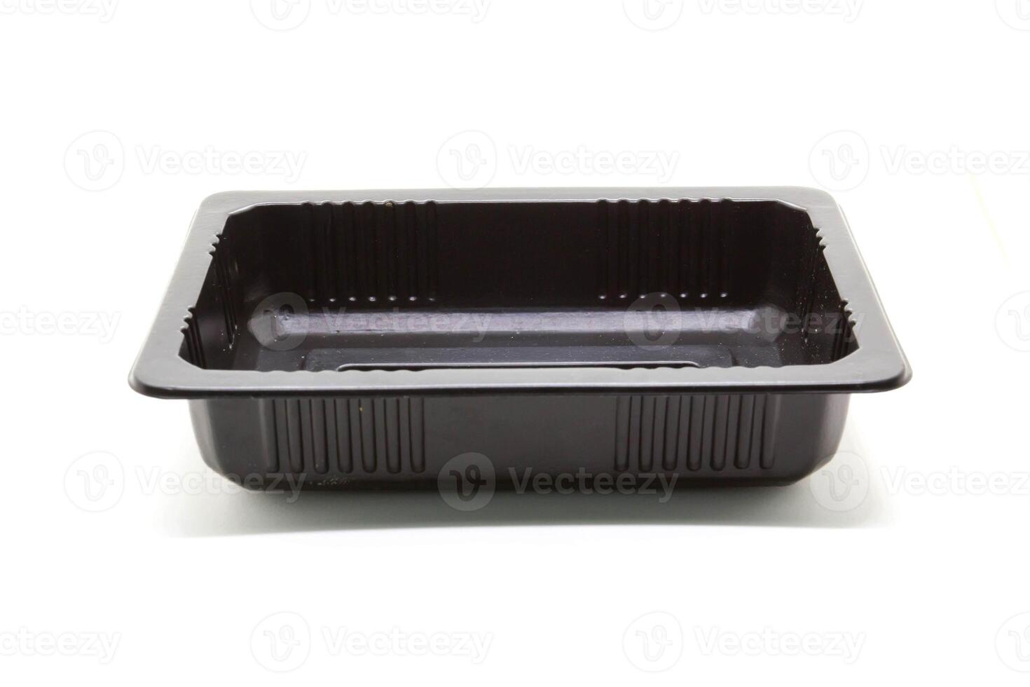Black Plastic food container on white background photo