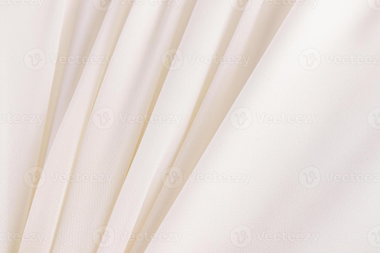 Soft parallel pleats of creamy chiffon fabric. A chic piece of silk fabric. A copy of the space. wedding background. layout photo