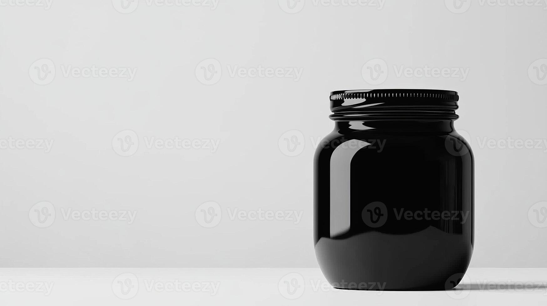 Black jar on white background, minimal photo