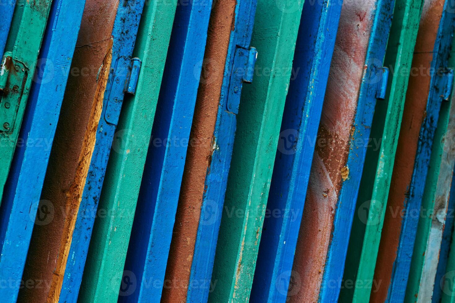 Old multi colored doors left after replacement and repair photo