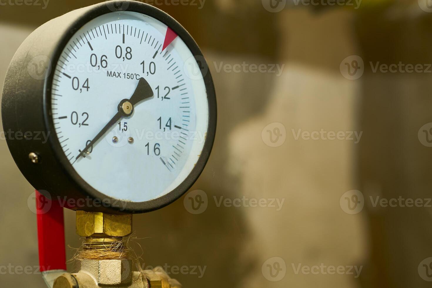 Hot water temperature sensor in a basement plumbing system photo