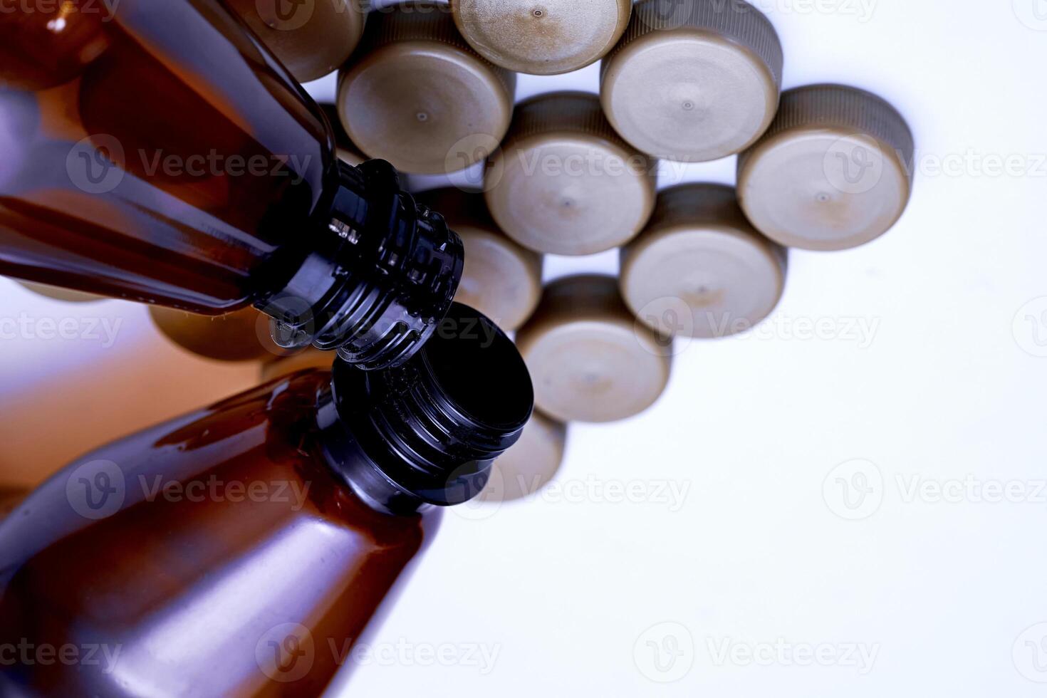 Brown plastic various bottles with corks for detergents,beer,soda,lemonade photo