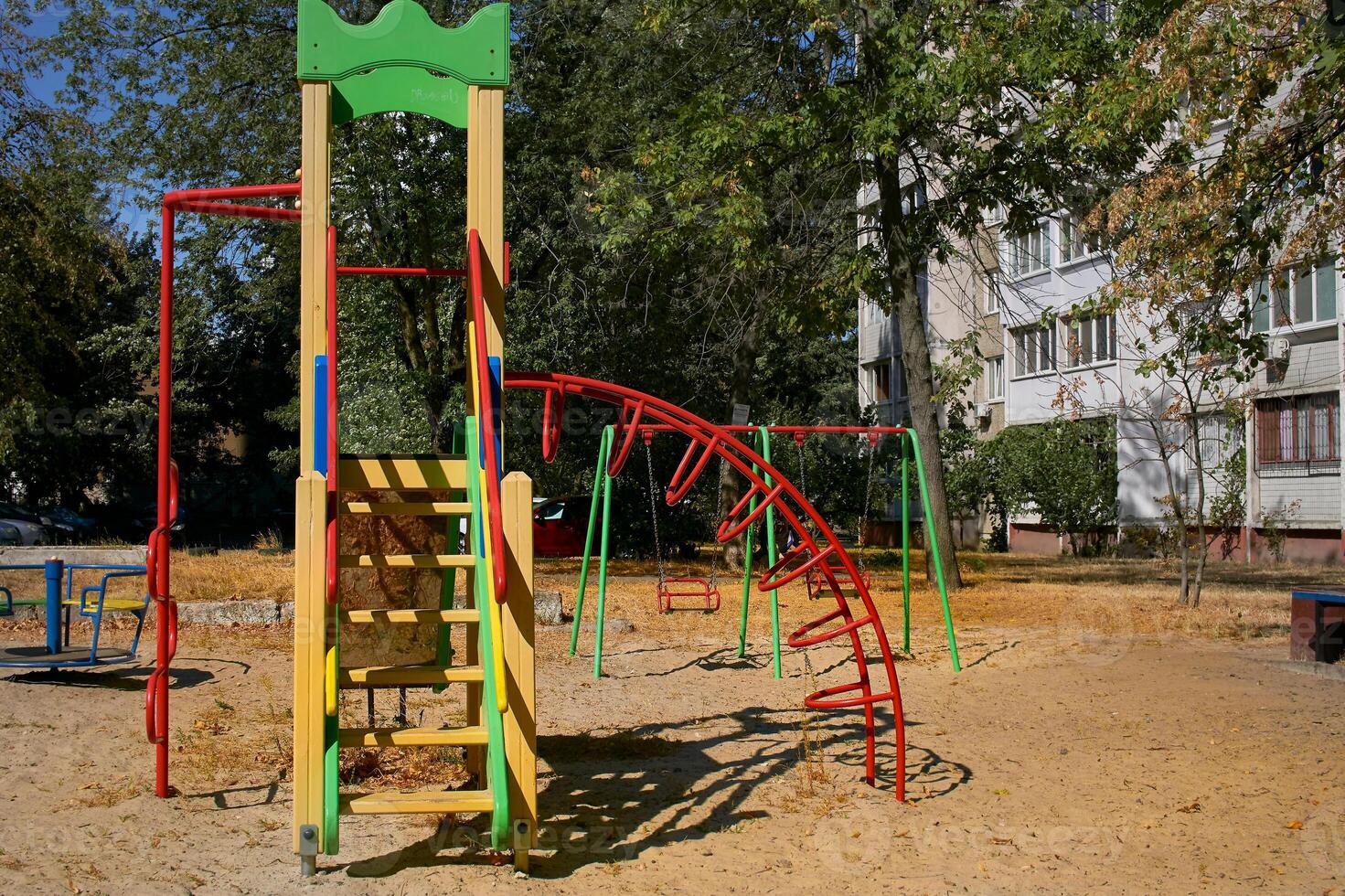 Summer spring children's playground with painted toy slide photo