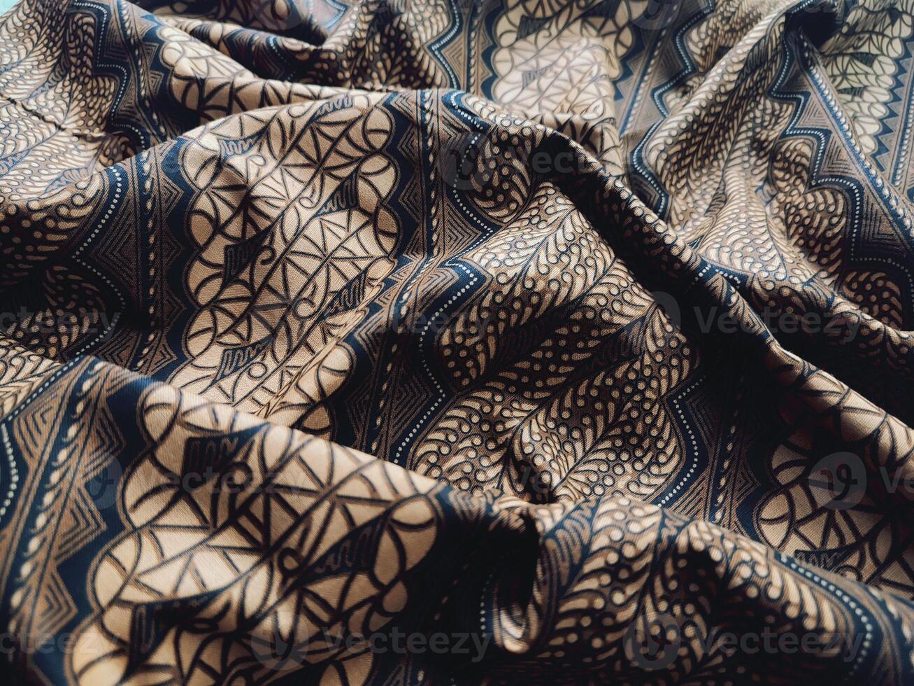 close up of a black and brown pattern fabric photo