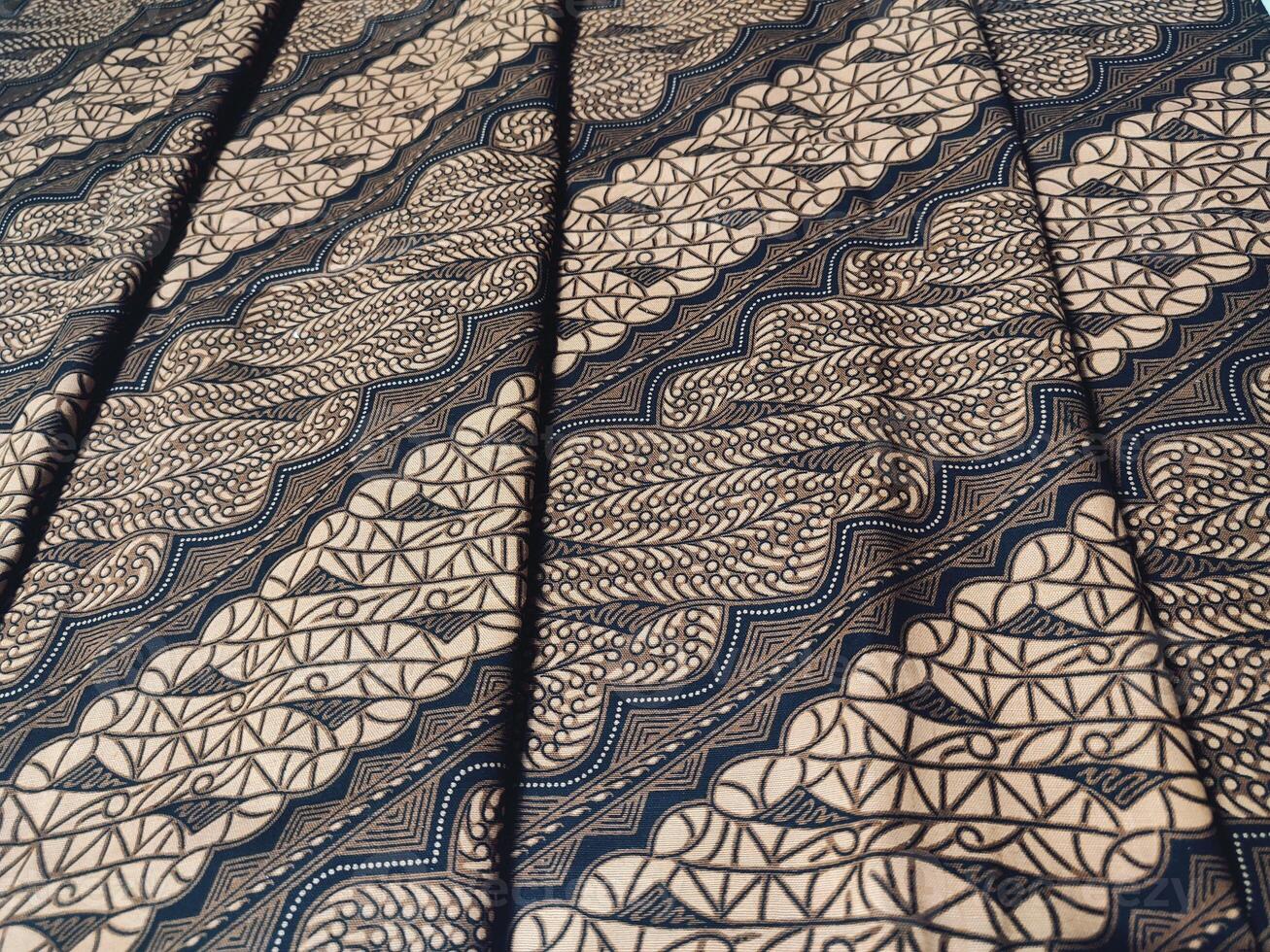 a black and white lace fabric with a pattern photo