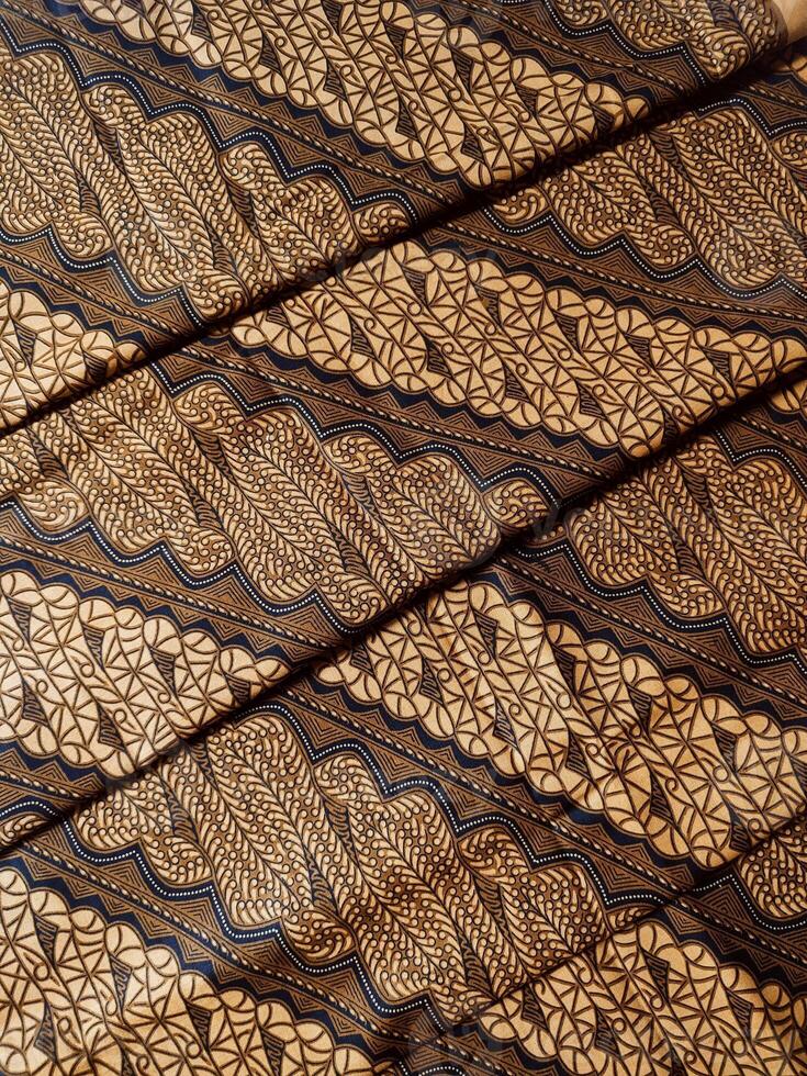 Black and gold patterned fabric photo