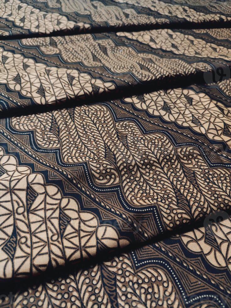 a close up of a black and white lace fabric photo