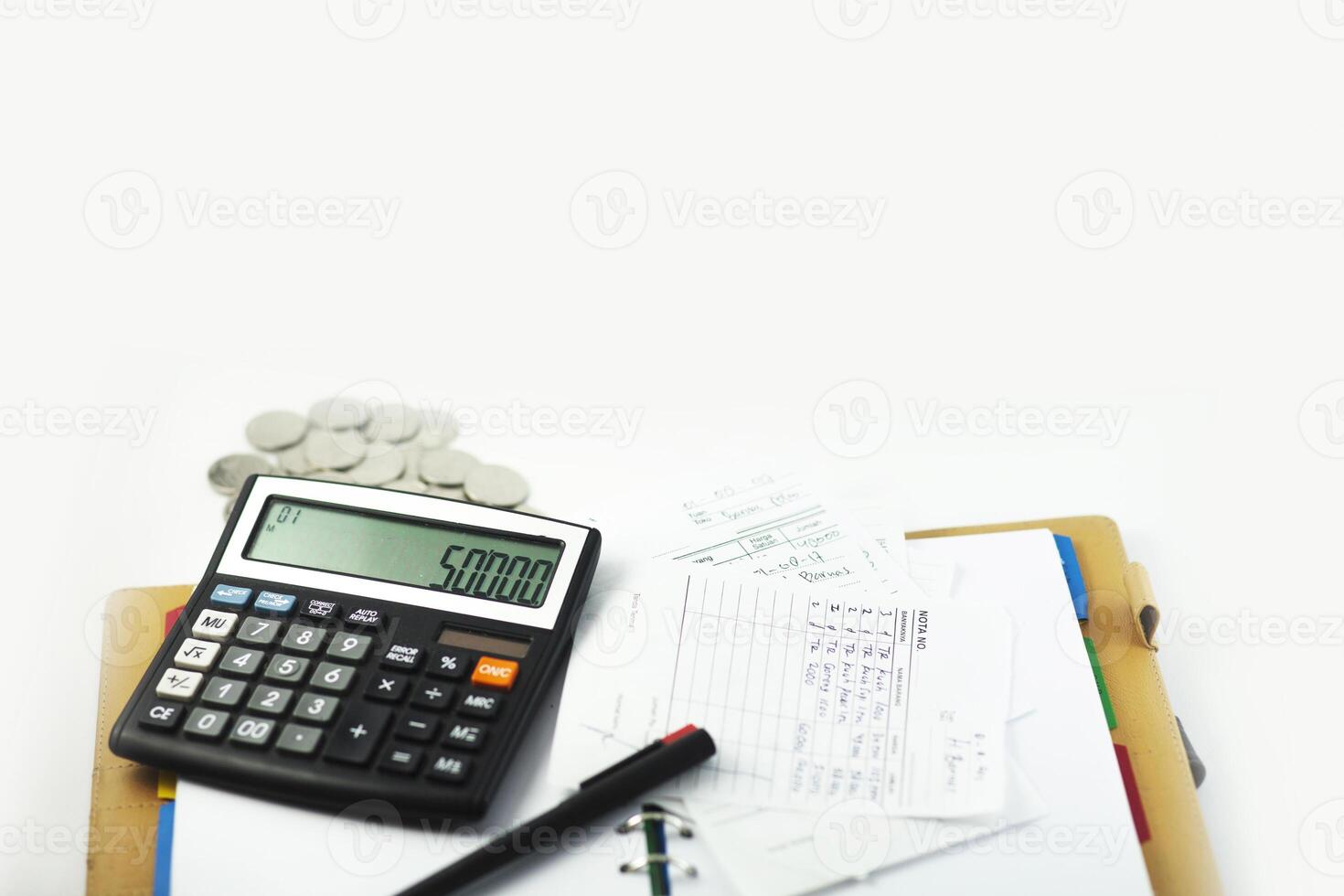 Business desk with calculator, notebook, and bills. Copy space website banner concept photo