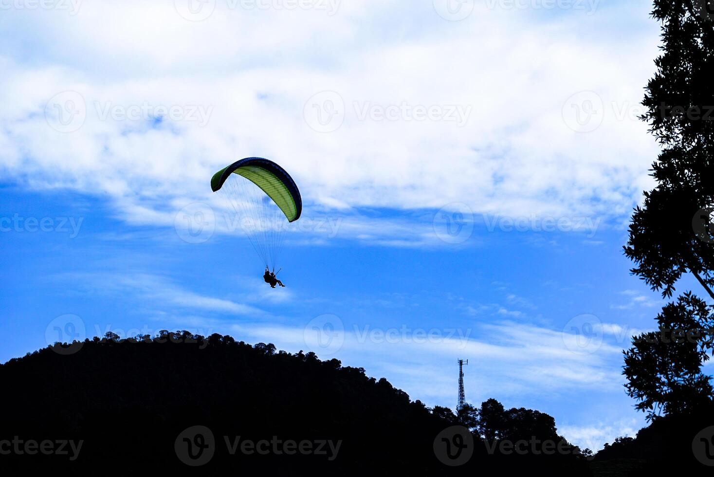 Paragliding on the mountains photo