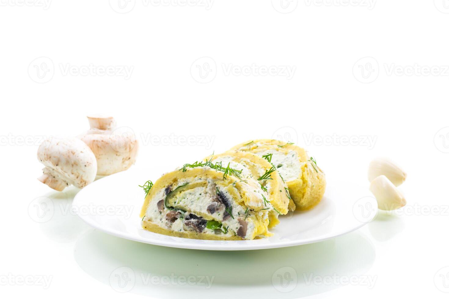 Organic homemade recipe. baked potato roll with cottage cheese filling with garlic and mushrooms, isolated on white background photo