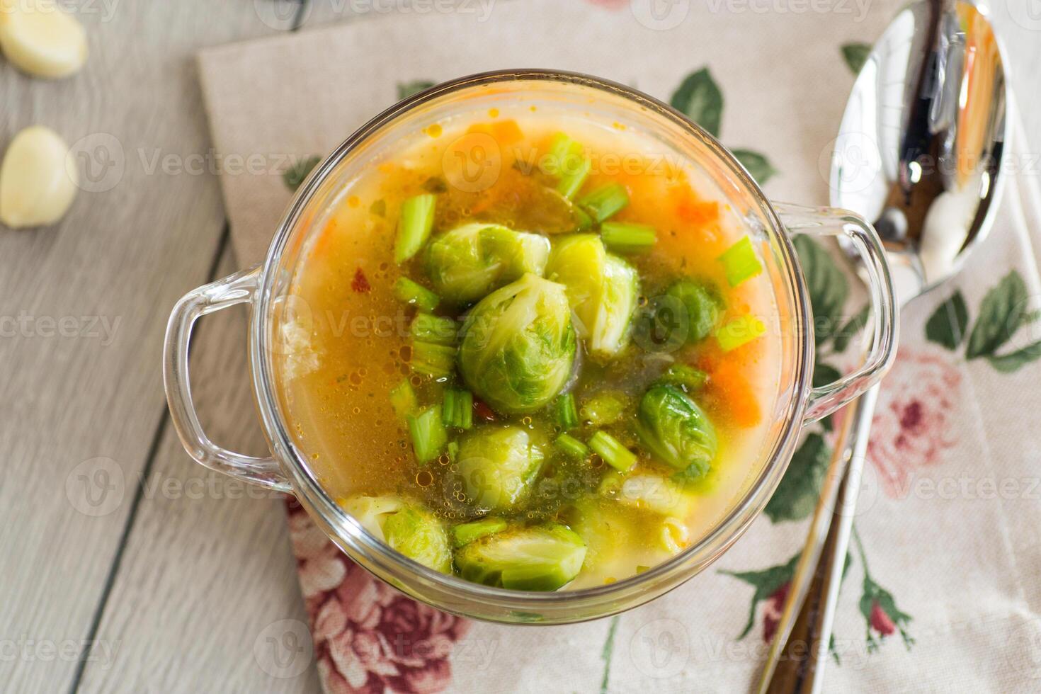 View from above. Hot Broth with Brussels Sprouts and Vegetables photo