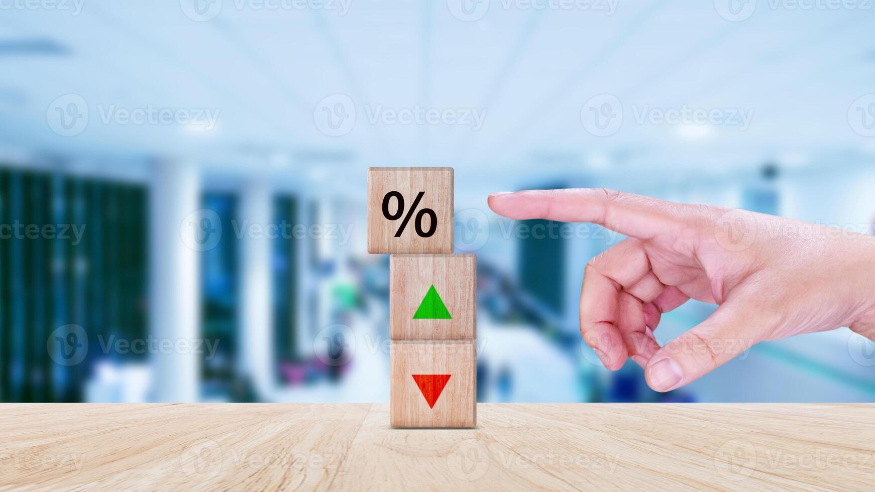 Financial, stocks, interest rate and GDP percent change, wooden block with percentage sign and arrow up sign and down for interest rate, ranking, percentage photo