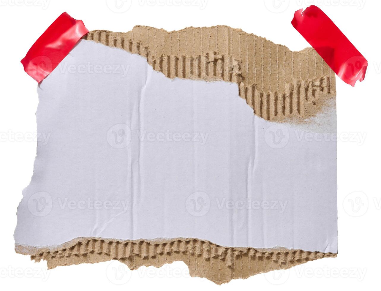 Torn piece of white corrugated cardboard attached to red piece of electrical tape, isolated background. photo