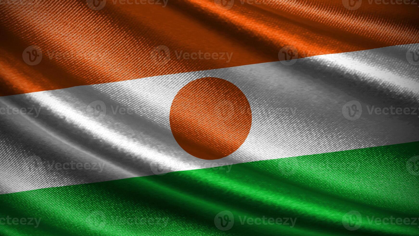 Niger flag with realistic silky wave texture photo