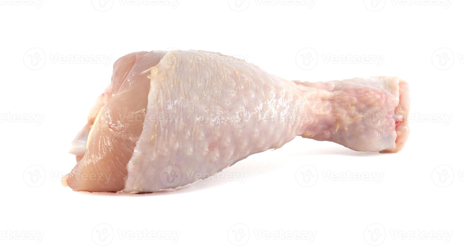 Raw chicken leg isolated on white background photo