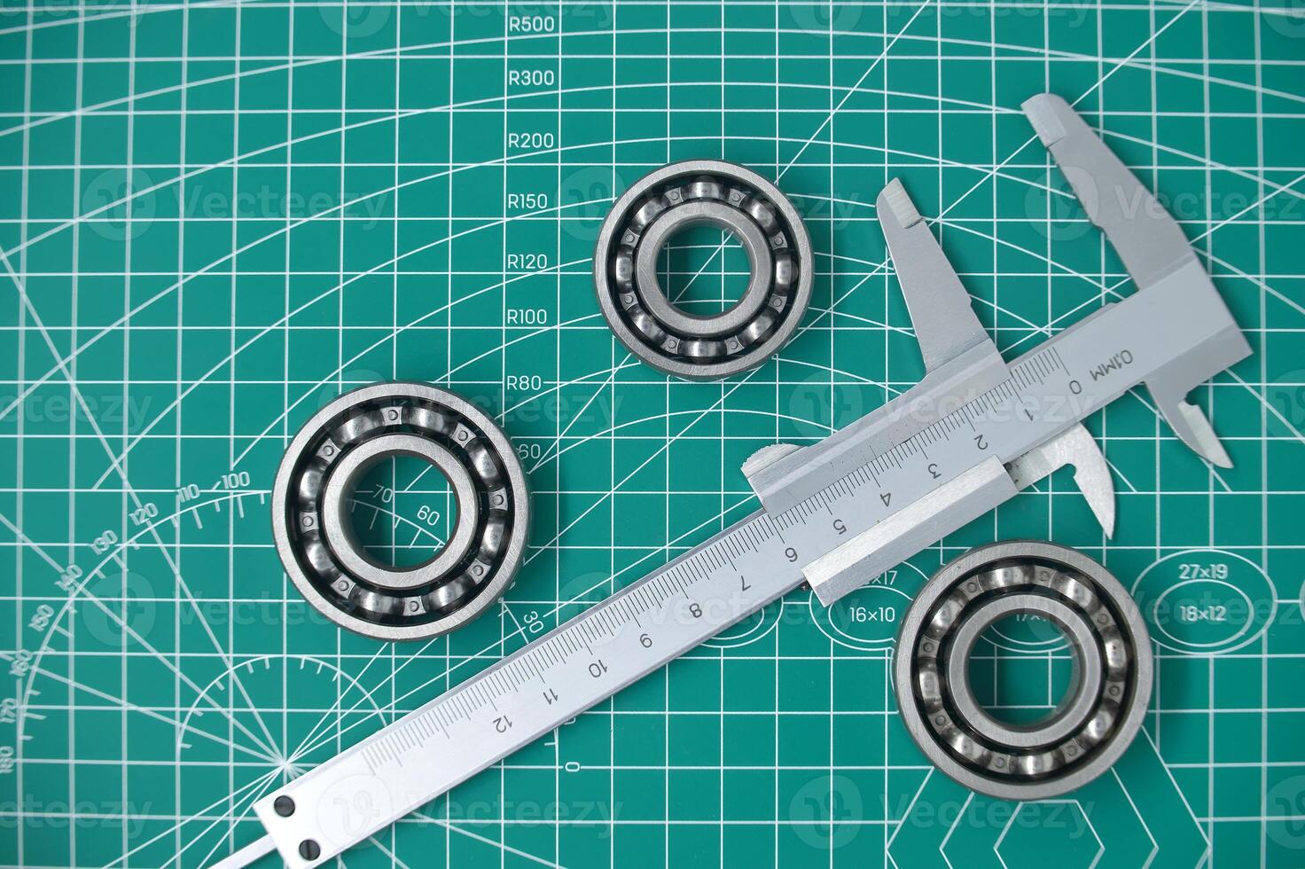Precision Ball Bearings and Caliper in a Technical Measurement Environment photo