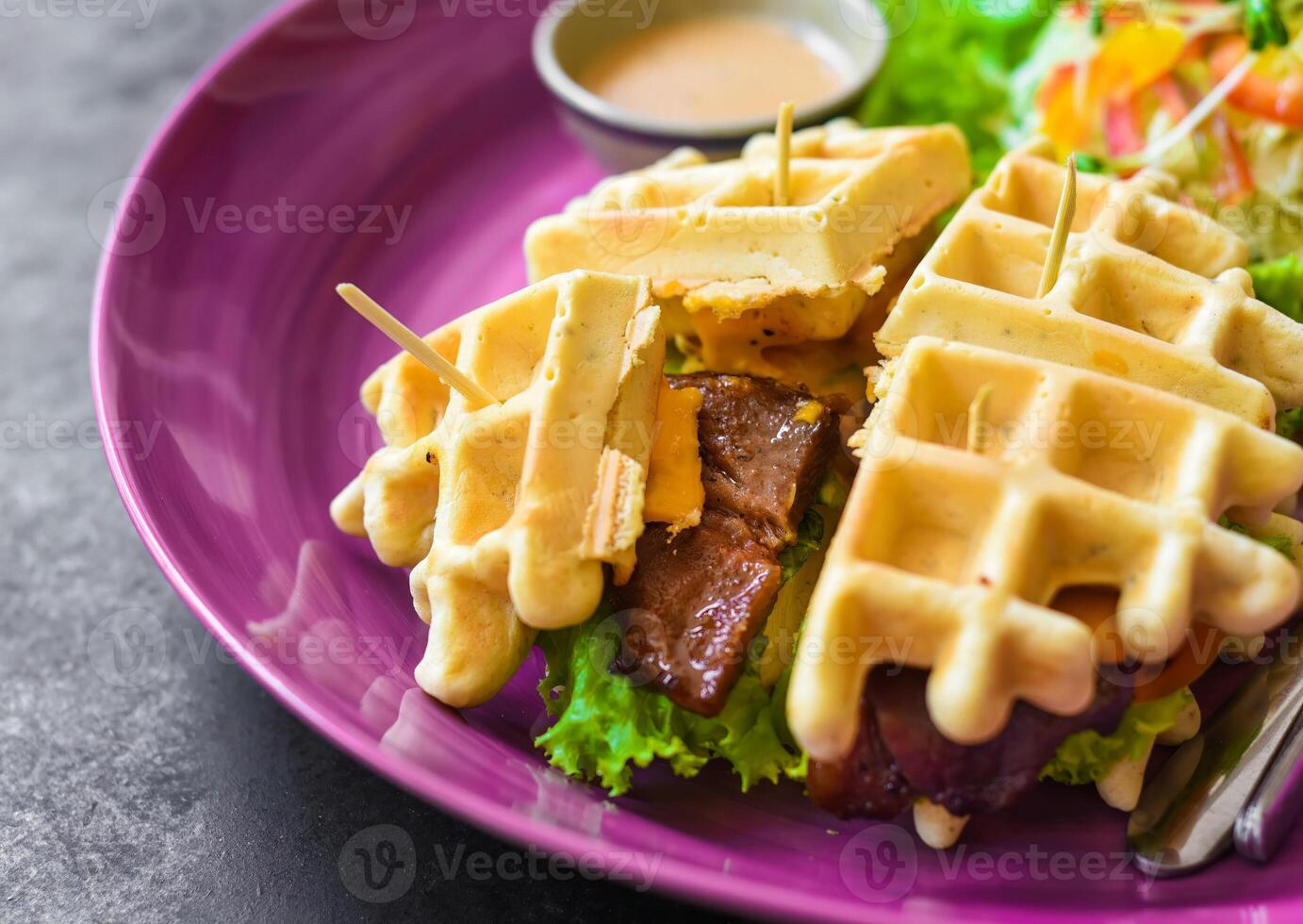 Belgian waffles Char siu pork with salad closeup photo