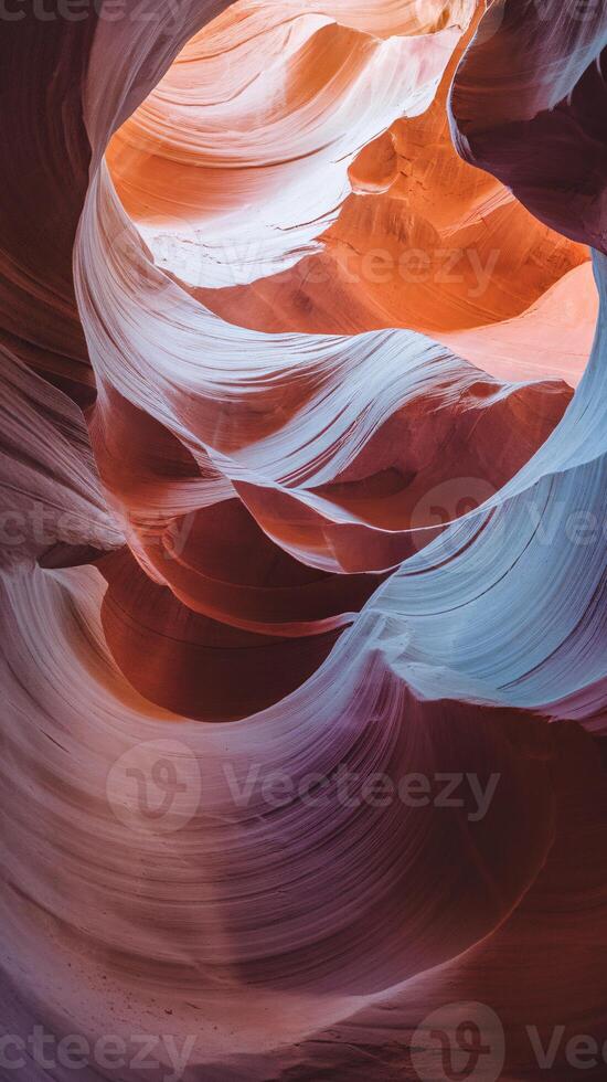 Beautiful abstract patterns of red and blue rock formations in a stunning canyon. photo