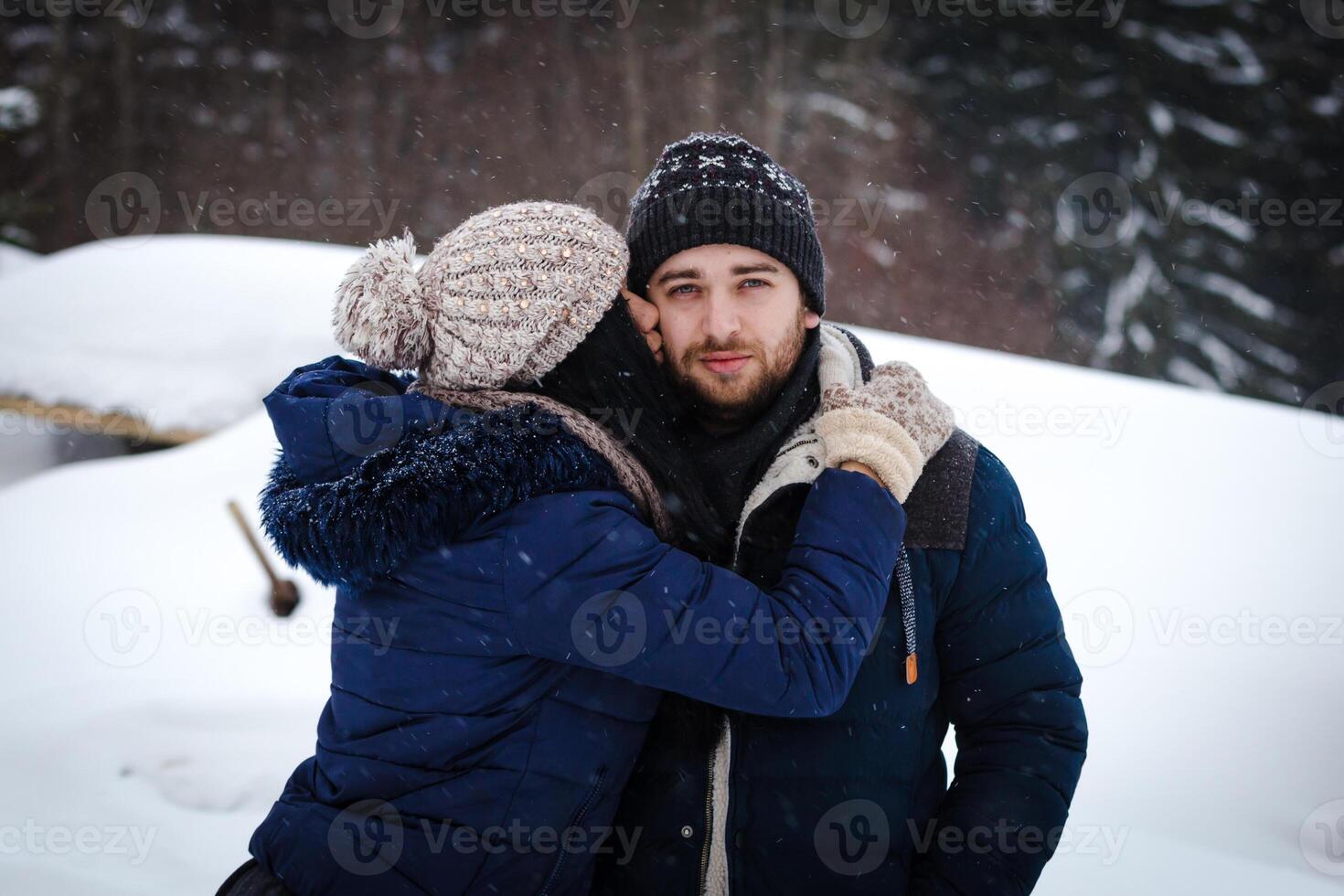 couple in love in winter background photo